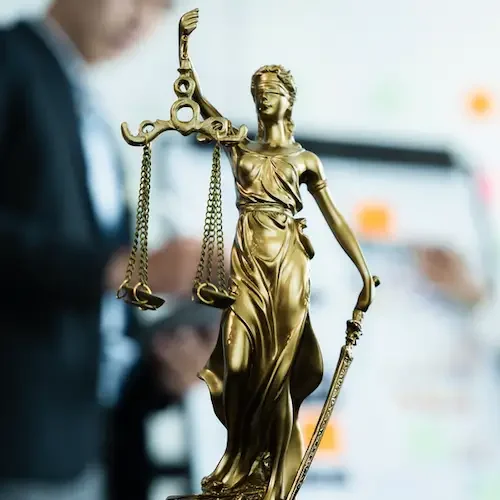 Statue of justice representing intellectual property enforcement