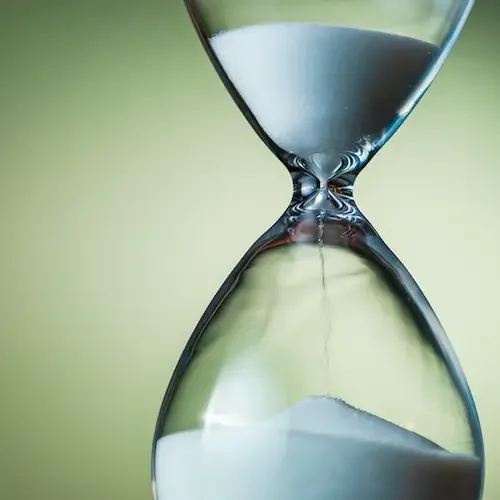 Hourglass representing time-sensitive copyright enforcement