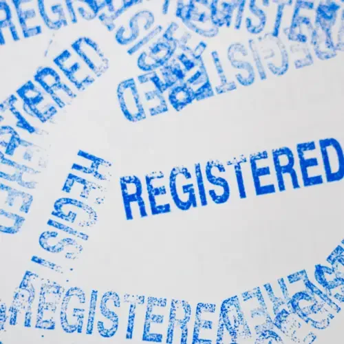 Repeated “Registered” text representing copyright registration