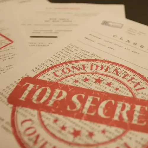 Documents labeled “Top Secret” representing trade secret protection